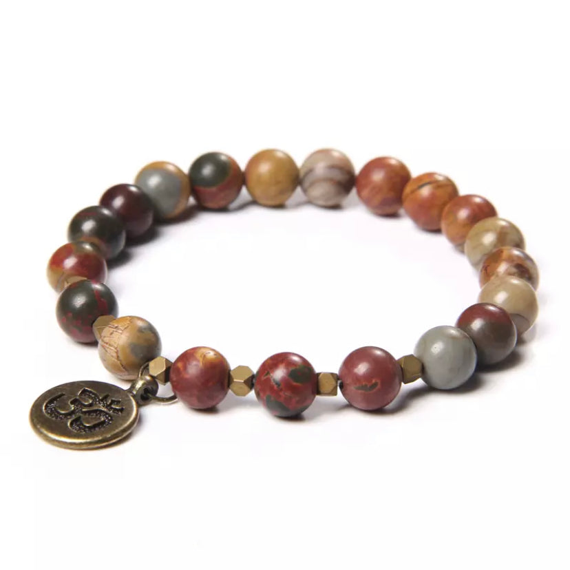 PULSERA COLGANTE OM TIERRA